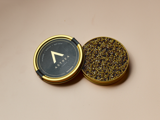 a can of astrea caviar with the lid open 