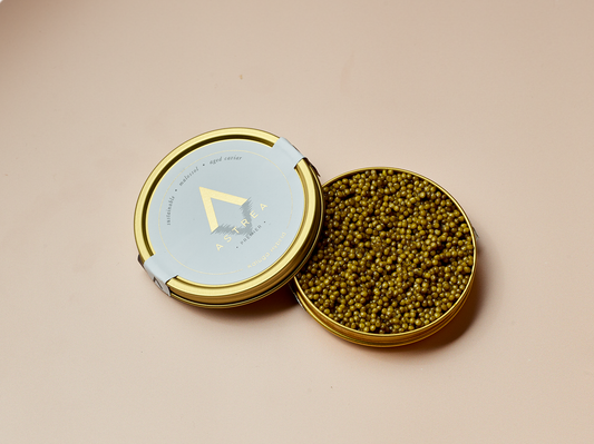 a can of astrea caviar with the lid open 