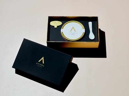 a black box holding caviar with the words Astrea Caviar on it 